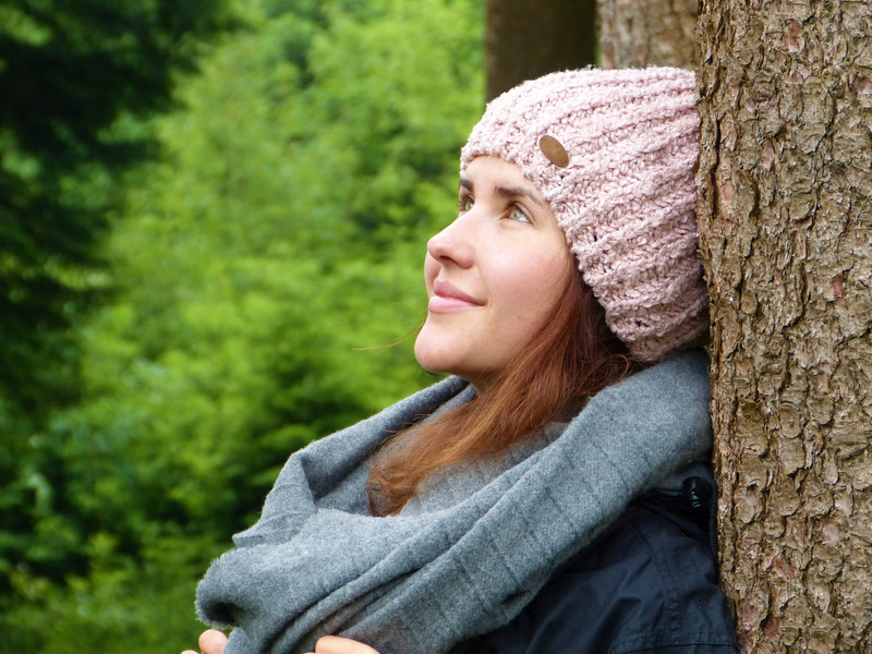 Woman discovering what forest bathing is