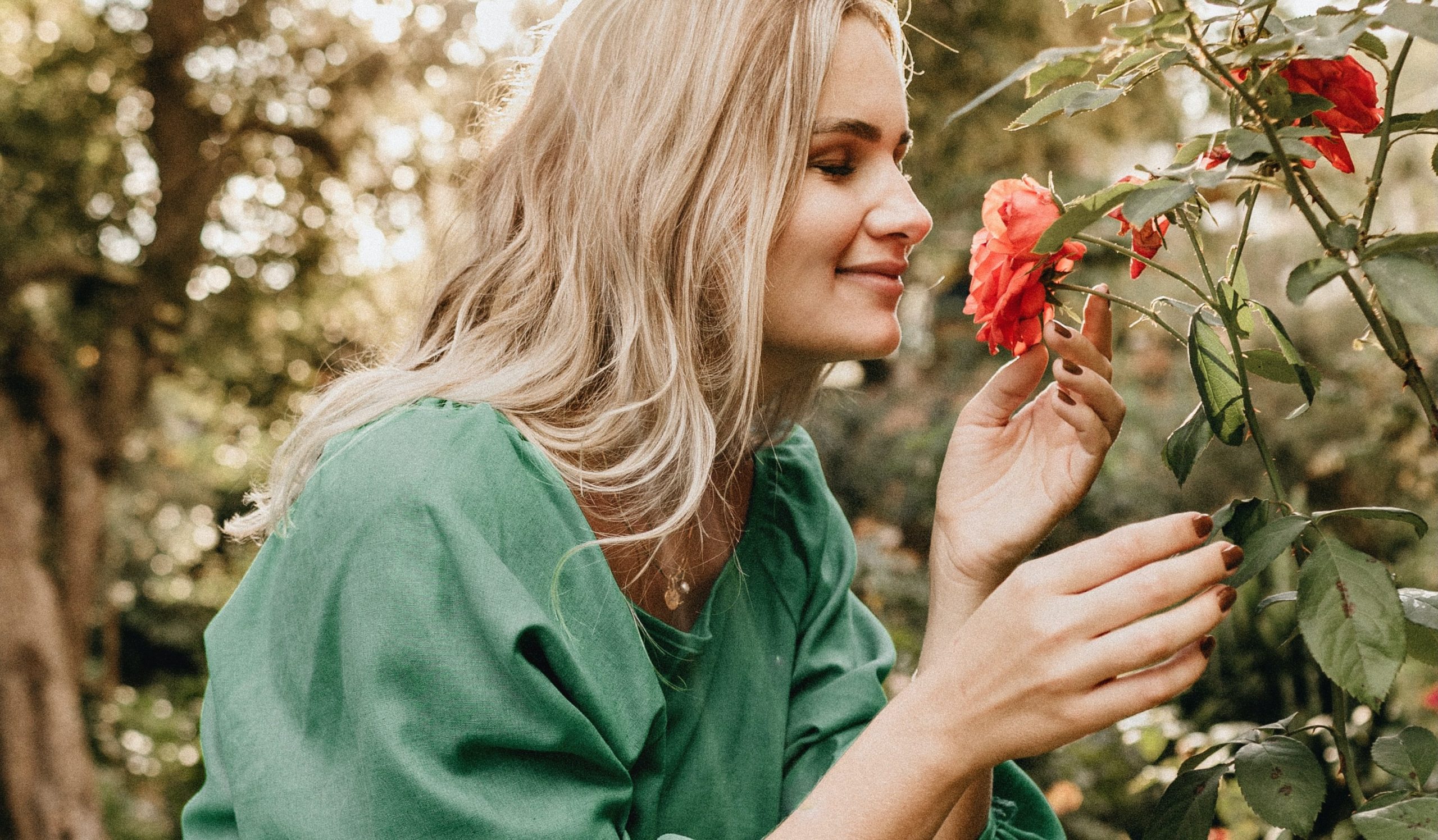 Woman smelling flowers