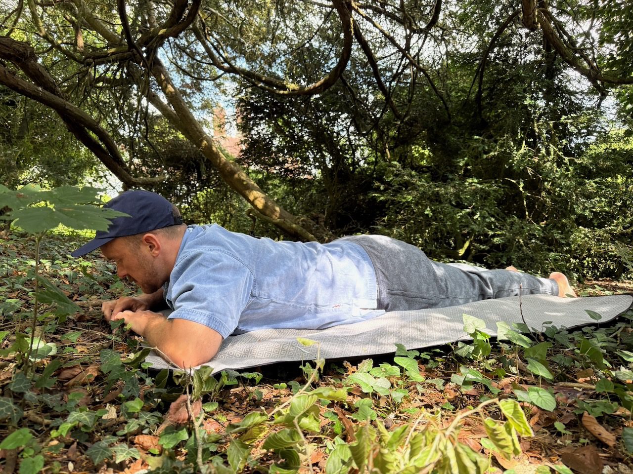 Man exploring Mother Earth with his hands